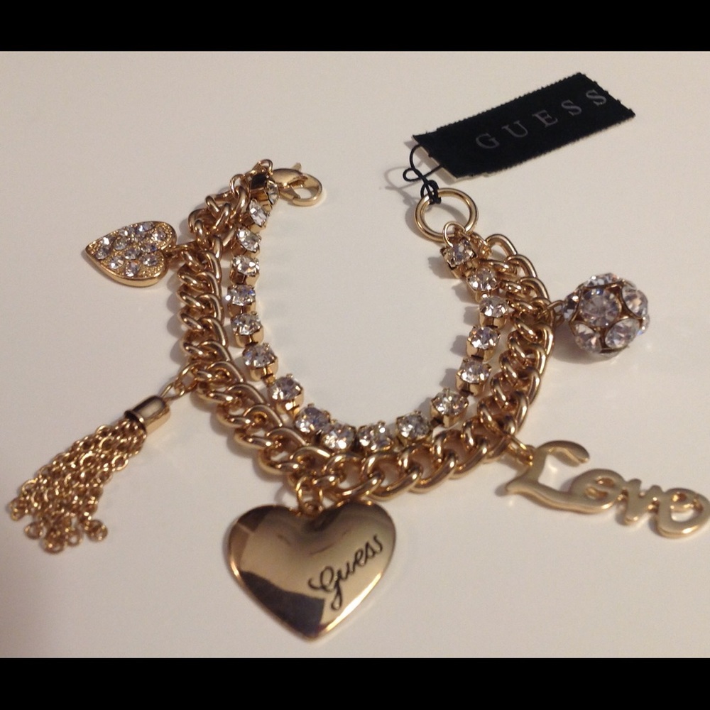 NWT Guess gold-tone rhinestones charm bracelet
